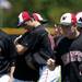 Milan players embrace after losing to Richmond 3-2 on Friday, June 14. Daniel Brenner I AnnArbor.com